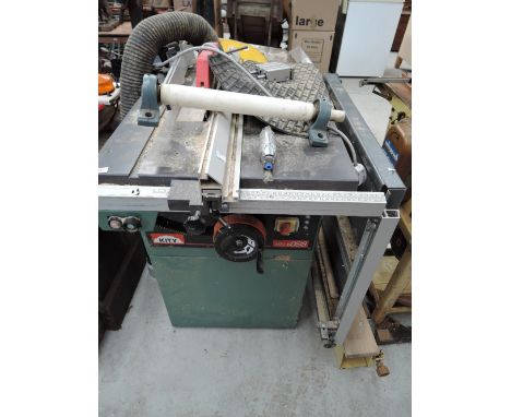 A vintage machine shop table and bench saw by Kity 10 0618