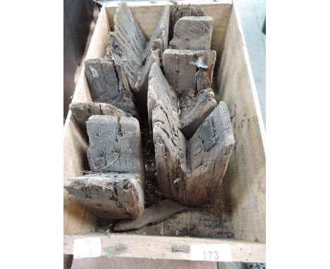 A selection of vintage wooden pegs or props