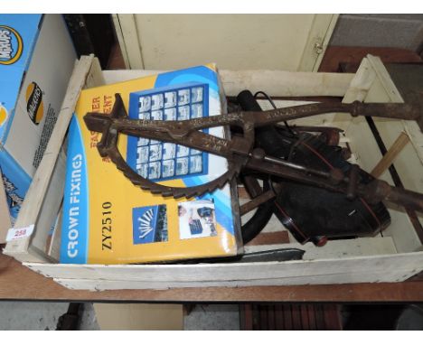 A selection of vintage tools and cast tyre spreader by Widdex