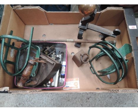 A selection of vintage assorted hardware including stove iron and HM whip handle