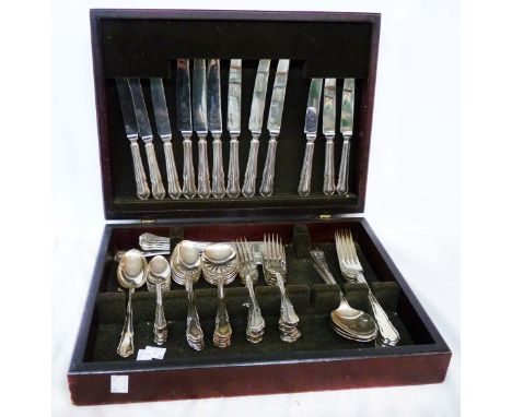 A vintage canteen containing a part set of silver plated 'Dubarry' pattern and other cutlery