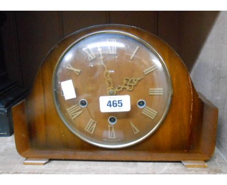 A vintage Smiths walnut cased mantel clock with eight day chiming movement