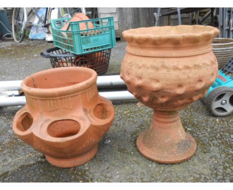 A terracotta strawberry pot - sold with a planter