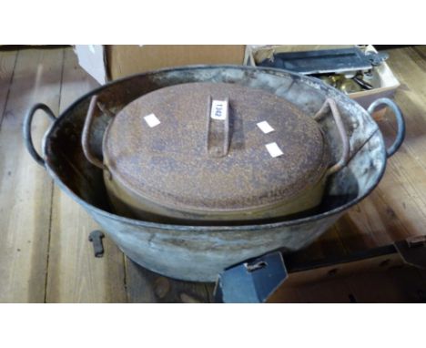 An old Kenrick &amp; Son No2. four gallon saucepan of oval form with original tin lid - sold with a small galvanised tin bath