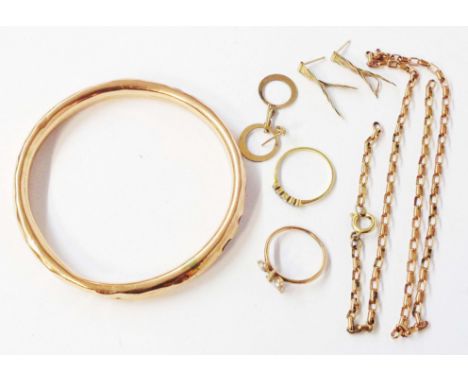 A bag containing a quantity of yellow metal jewellery including dented bangle, chain, rings, etc.