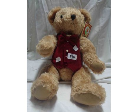 A modern 'Henry' plush Teddy bear with red waistcoat and bow tie