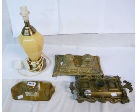 A cast brass double inkstand with Rococo decoration, a pressed brass single example with brass inkwell and another - sold wit