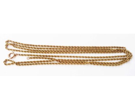 A button marked 9c yellow metal rope-twist guard chain - 1.39m long