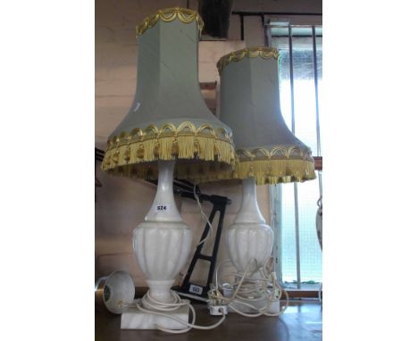 A pair of vintage alabaster table lamps of urn form - each sold with a tasseled shade