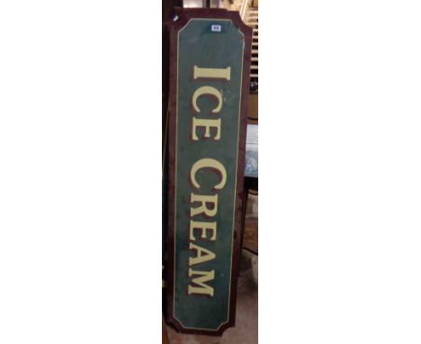 A vintage railway 'Ice Cream' sign with gloss red border and shadowing to the white transfer letters on a green/blue ground