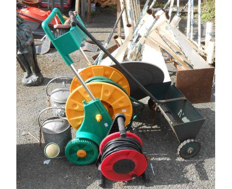 A quantity of assorted tools including hose reel, watering cans, etc.