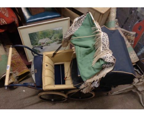 A vintage Tri-ang pram from Duncan's Pram Shop, Tunbridge Wells - a/f