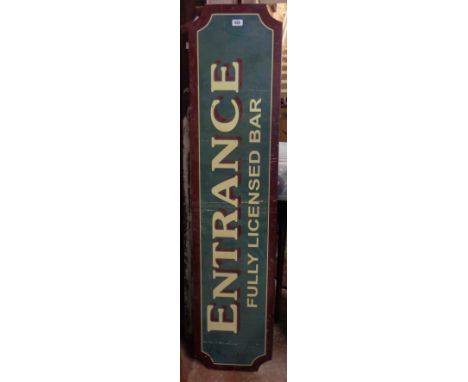 A vintage railway 'Entrance, Fully Licensed Bar' sign with gloss red border and shadowing to the white transfer letters on a 