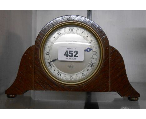A vintage Elliott polished oak cased small timepiece with dial marked for retailer Mortimer Ricks, Paignton and eight day mov