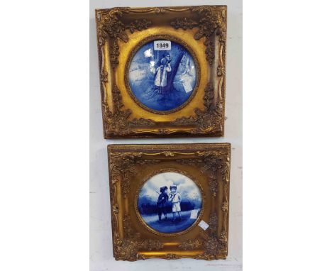 A pair of modern ceramic plaques decorated with scenes in the Royal Doulton blue children style set in moulded gilt frames