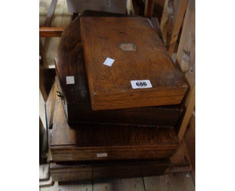 Four vintage wooden cutlery boxes