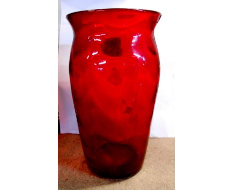 A Powell Whitefriars ruby glass vase of tall tumbler form with internal wave decoration