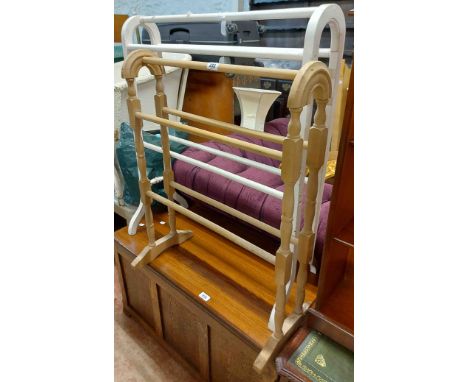 Two vintage double towel rails, one with white painted finish