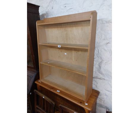 A 76cm modern mixed wood four shelf open bookcase
