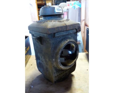An old British Railways (Eastern Region) cast iron G72 railway lamp with red bull's-eye lenses
