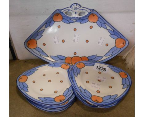 A Burleigh Ware Charlotte Rhead designed pottery sandwich set with tube-lined decoration depicting fruit and foliage, compris