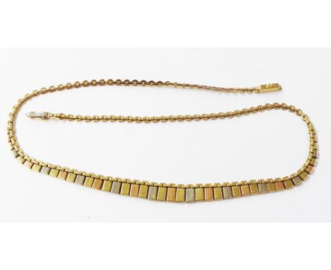 A vintage 375 (9ct.) three colour gold dentil-link necklace