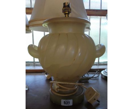 An old alabaster table lamp of urn form