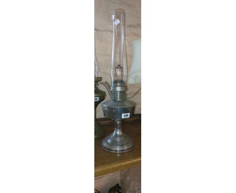 A vintage Aladdin Model No. 12 oil lamp with chrome base