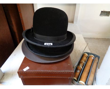 Rowell Outfitters of St.Ives bowler hat other hats and a small leather case
