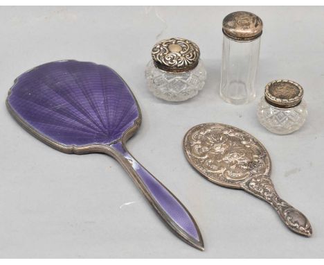 A hallmarked silver and purple enamel hand mirror (af), a small Continental 900 grade embossed hand mirror, and three silver 