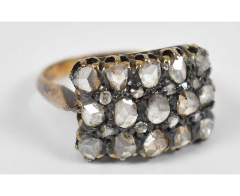 A 18ct yellow gold ring with fifteen white stones, size K, approx 3.4g.