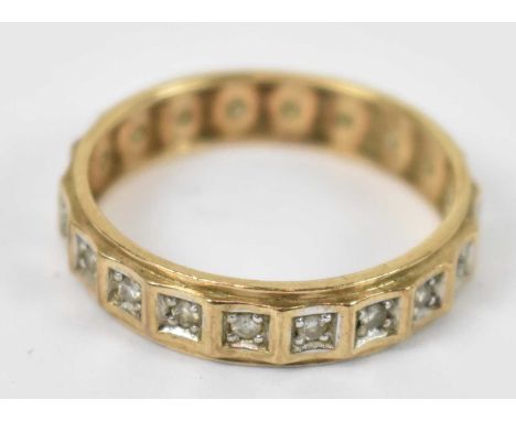 A 9ct yellow gold and diamond eternity ring, size O, approx 2.3g.
