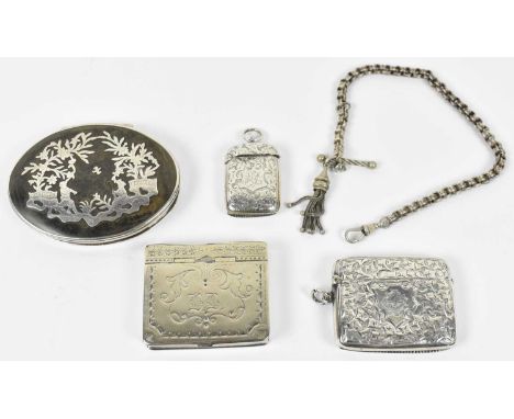 Two Birmingham hallmarked silver vesta cases with engraved decoration, a 19th century white metal and tortoiseshell oval snuf