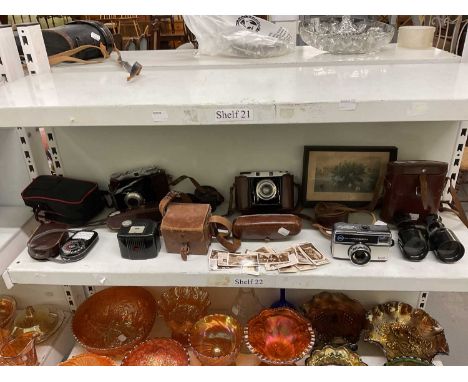 A small collection of vintage cameras including Kodak, also pair of binoculars.
