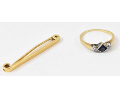 An 18ct yellow gold sapphire and diamond ring, size P, also an 18ct gold bar brooch/tie pin, combined approx 6.8g (2).