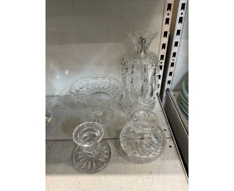 WATERFORD; four pieces of Waterford crystal comprising of a crstal drop candlestick, a candle holder, bowl and squat vase.