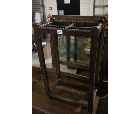 A Polished Oak Stick Stand