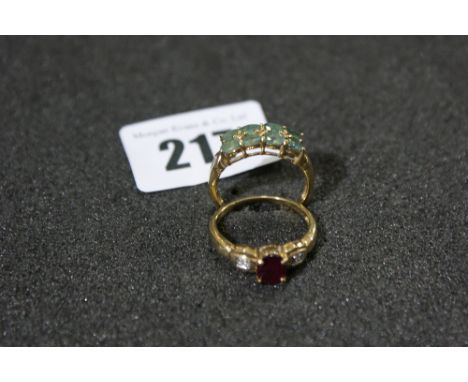 A 9 Carat Gold Ruby And Diamond Set Gold Ring Together With A Further Gold Ring