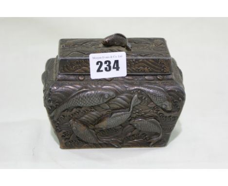 A Cast Metal Oriental Tea Caddy Relief Decorated With Swimming Carp