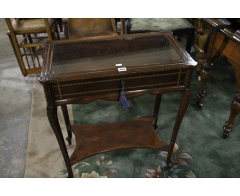 A Mahogany And Inlaid Silver Table With Base Shelf