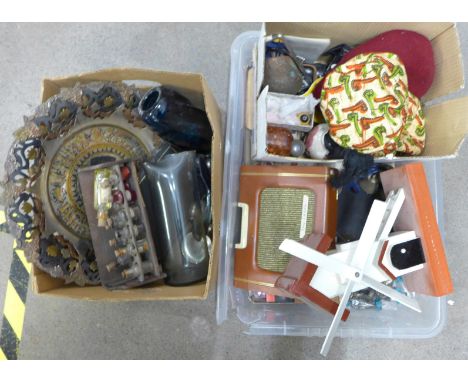 Two boxes of miscellaneous; harmonica, heavy blue glass vase, radio, beads, Egyptian charger, etc. **PLEASE NOTE THIS LOT IS 