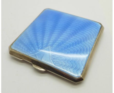 A silver and blue enamel compact with mirror and powder puff, by Walker &amp; Hall 