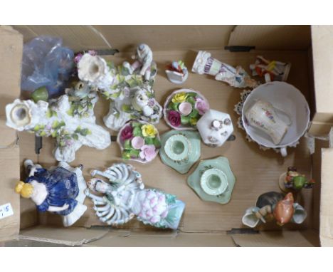 Two Hummel figures, a pair of continental candlesticks, a/f, other porcelain figures, a pair of dwarf candlesticks, etc. **PL