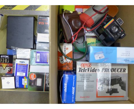 A box of mixed camera equipment, a Polaroid Land camera, Ilford camera, light meter, View-Master, Vivitar lens, boxed and oth