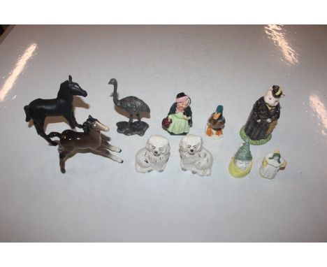 A Royal Worcester "Mr. Caudle" candle snuffer; another "French Cook"; a Royal Doulton miniature figure and a Beswick model "L