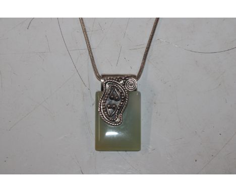 A Sterling silver and jade set pendant necklace, approx. 23.5gms 