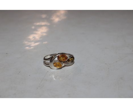 A Sterling silver and amber set ring, ring size N