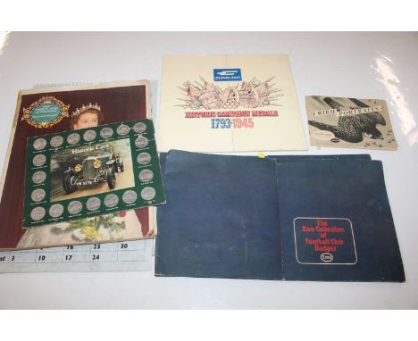 A collection of Esso Collection Football badges, Cleveland Historic Campaign medals, Historic Car coins, and various ephemera