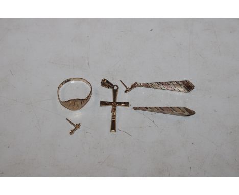 A 9ct gold crucifix pendant; and a 9ct gold ring, ring size P, approx. total weight 2.8gms; and a pair of yellow metal ear-ri