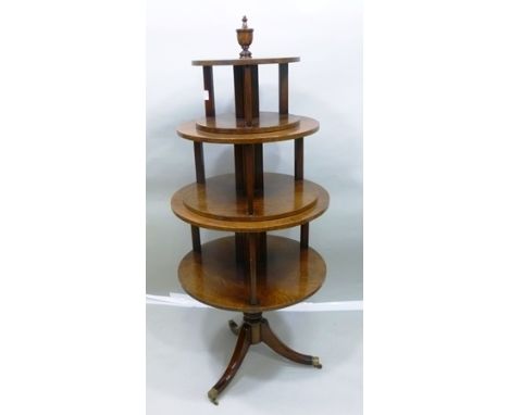 AN UNUSUAL GEORGIAN DESIGN TIERED REVOLVING BOOKCASE WHATNOT, having turned urn finial over three graduated sections on turne